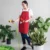 Ap04 unisex apron with 2 pockets worn by model