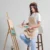 Ap04 unisex apron with 2 pockets worn by model