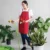 Ap05 unisex apron with multiple pockets worn by model