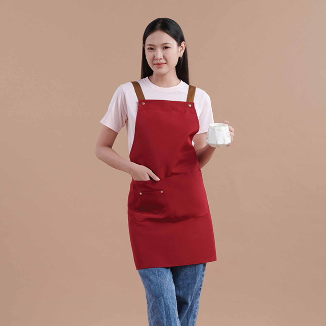 Ap06 unisex h-style apron with multiple pockets worn by model