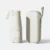 19 inch compact uv umbrella in off white folded beside its off white zip case