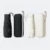 19 inch compact uv umbrella in black and off white, each with its matching zip case