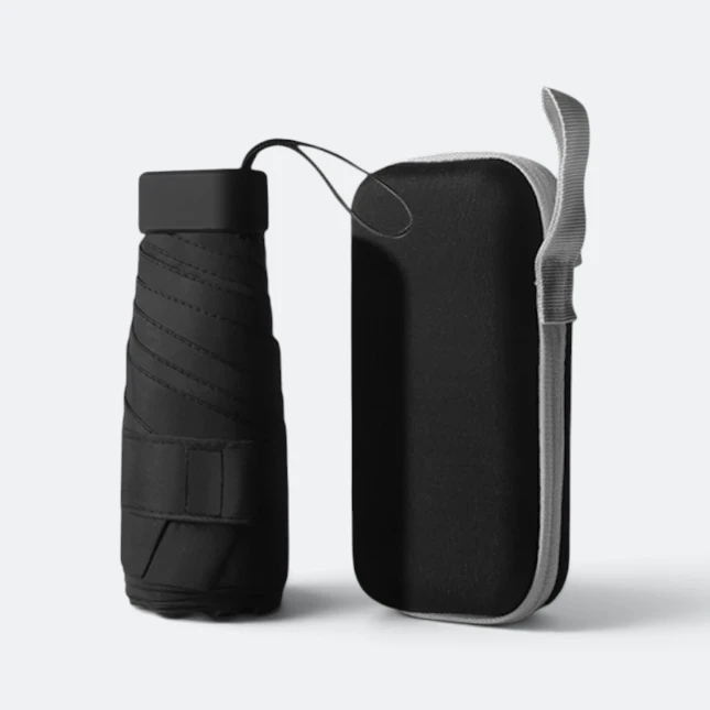 19 inch compact uv umbrella in black folded beside its black zip case