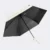 19 inch compact uv umbrella in off white opened, showing the black uv coating on the underside
