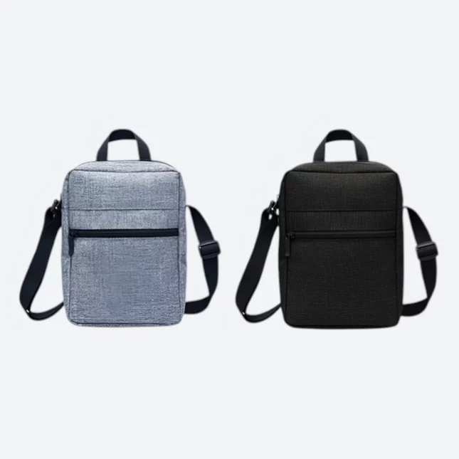 Kairos sling bag in grey and black, front view with shoulder strap