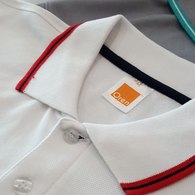 Qd53 quick dry cvc tipped collar and cuff polo shirt worn by model