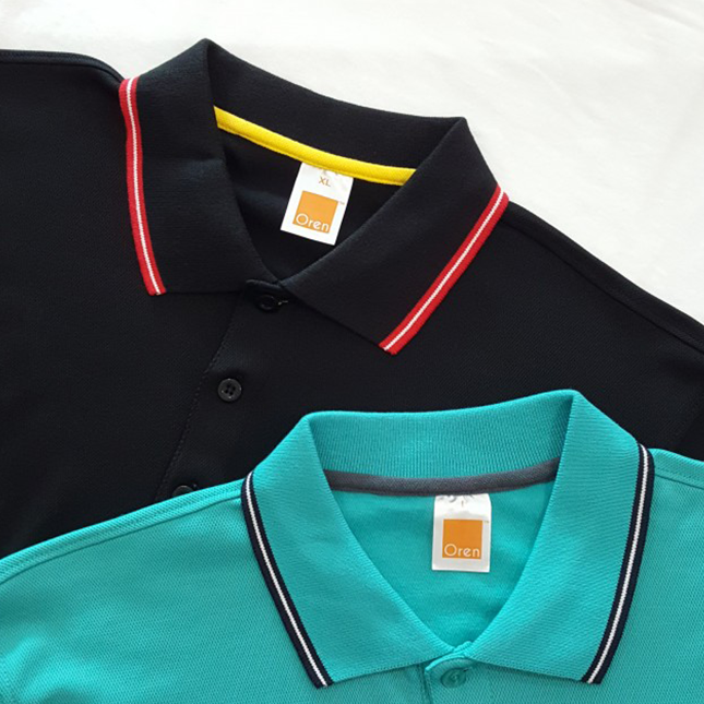 Qd53 quick dry cvc tipped collar and cuff polo shirt worn by model