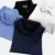 TT04 Tritan Premium Cotton-Poly Blend Polo Model 4 Tt04 tritan premium cotton-poly blend polo worn by model