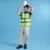 VT04 Sleeveless Safety Vest with Zip and Pockets Model 2 Vt04 sleeveless safety vest with zip and pockets worn by model