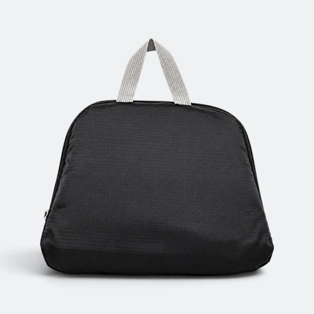 Gmg4233 tuckit foldable backpack 4 compartment black folded view, backpack corporate gift malaysia with logo printing
