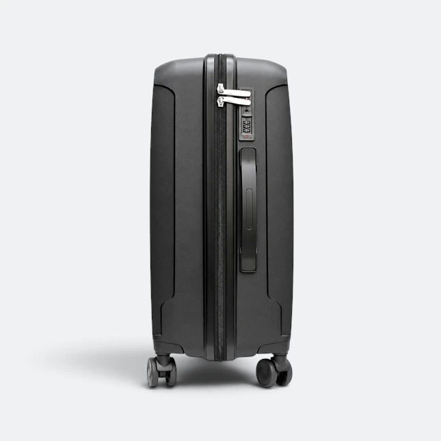 Gmg4255 stratos front pocket hard luggage 24" black side view, travel bag corporate gift malaysia with logo printing